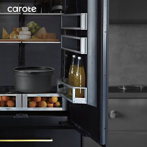 CAROTE silicone lids and trivets provide secure heat control.
