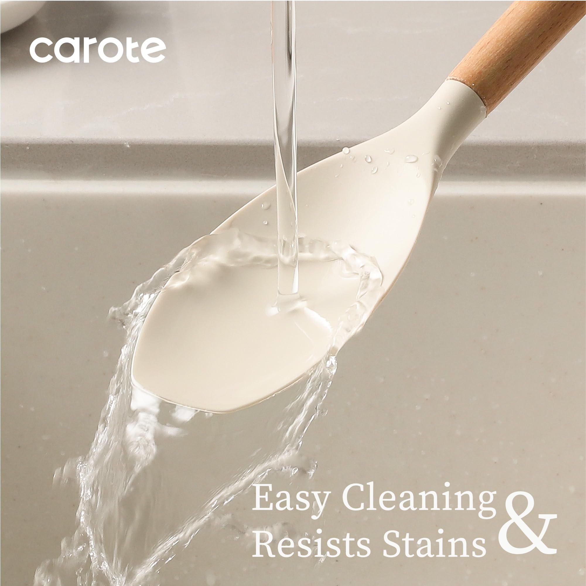 CAROTE slotted spoon features flexible silicone for safe stirring and serving.