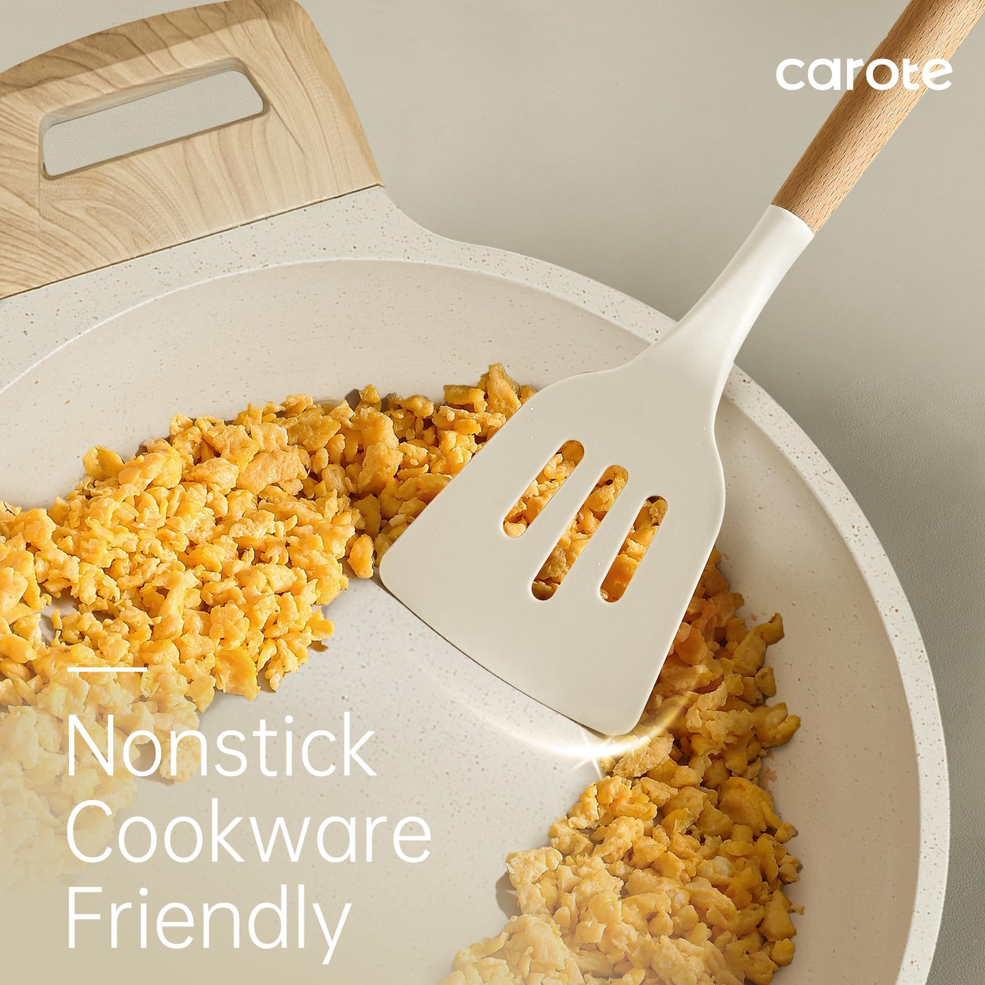 CAROTE spatula with wood handle shows ergonomic grip and heat resistance.