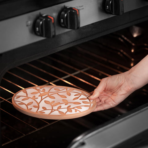 CASADEMA terra cotta warming stone enhances heat retention for fresh bread.