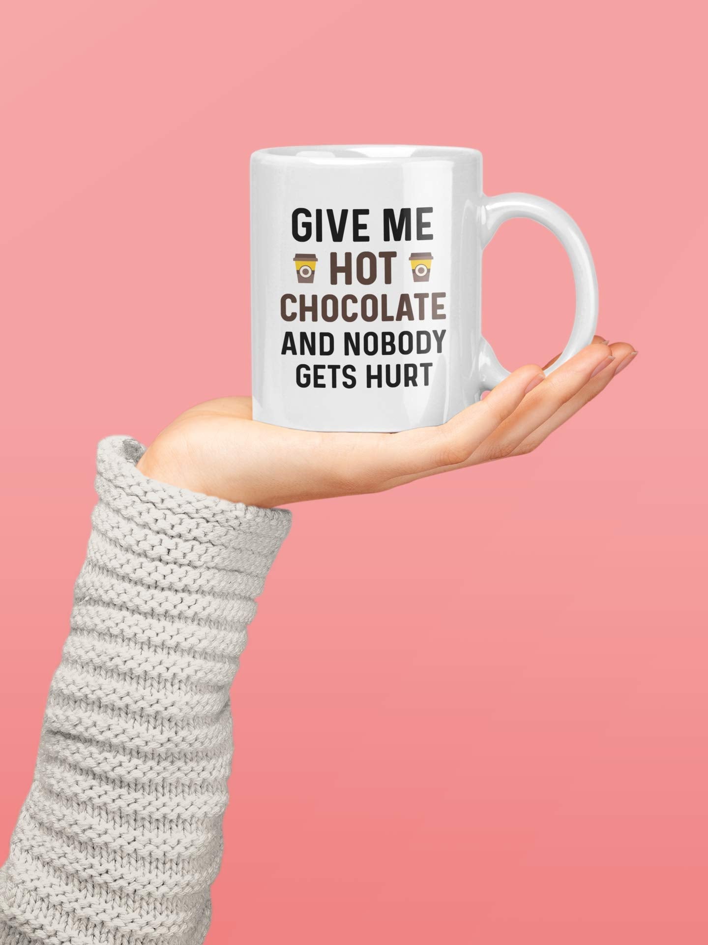 Casitika mug held by hands with steam inviting warm beverages.