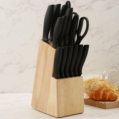 Compact pine knife block enhances kitchen decor and space efficiency.