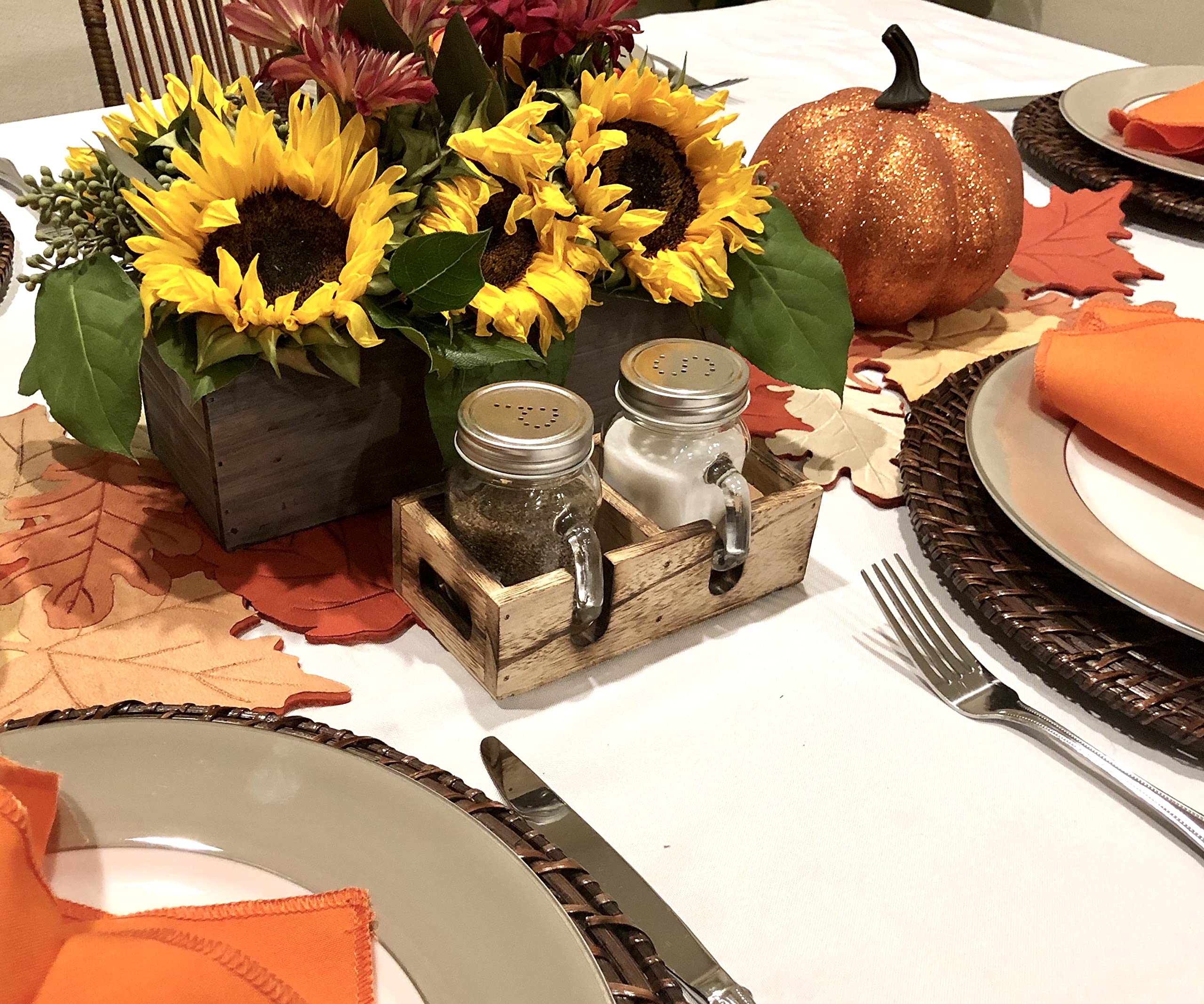 Solid wood caddy keeps jars organized and easy to move.