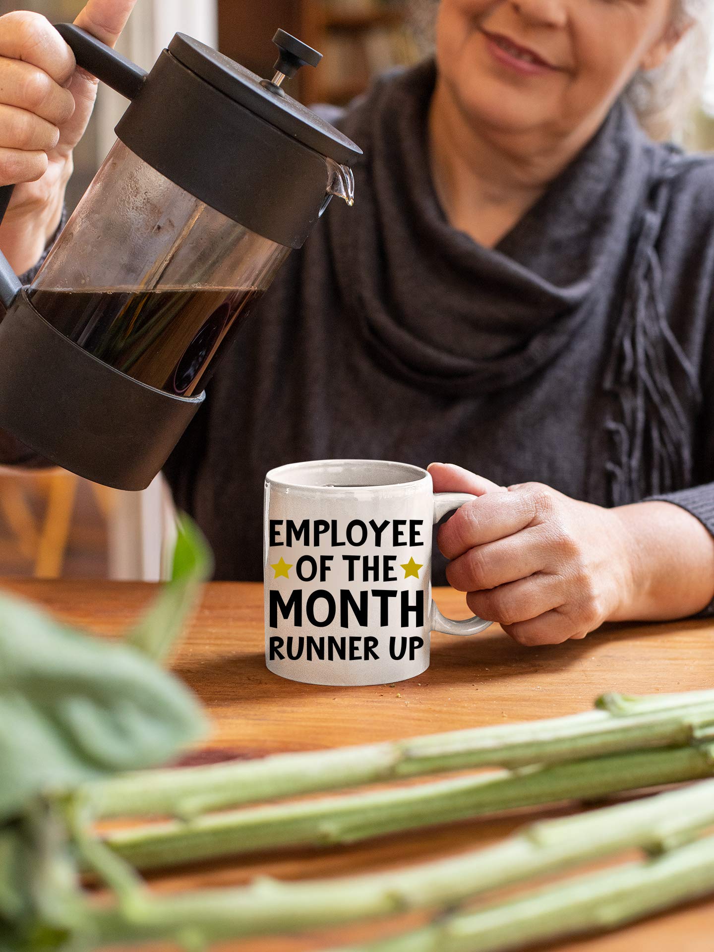 Two-sided CBTwear print visible on the ceramic mug