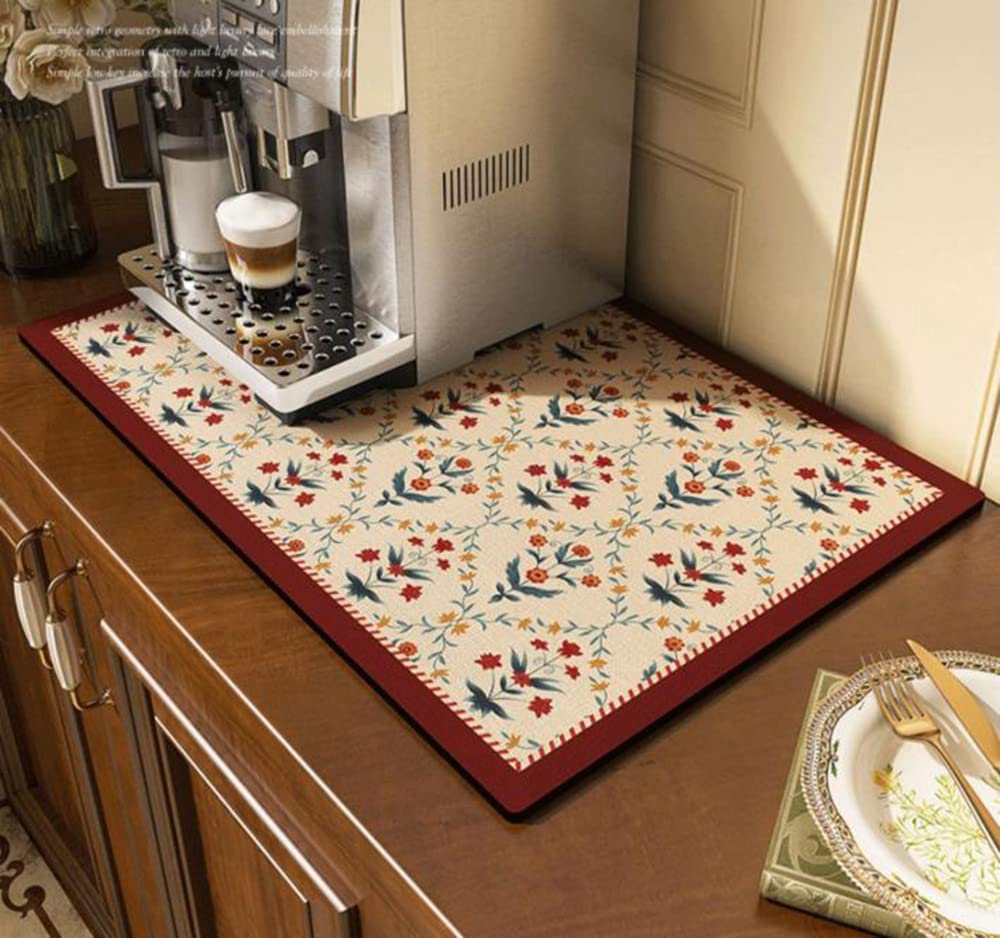 Cciphy coffee-maker mat on counter protects surfaces from spills.