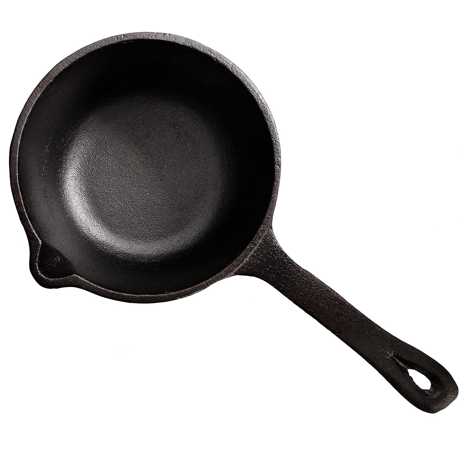 Cedilis basting pot on stovetop for quick warming and sauce prep.
