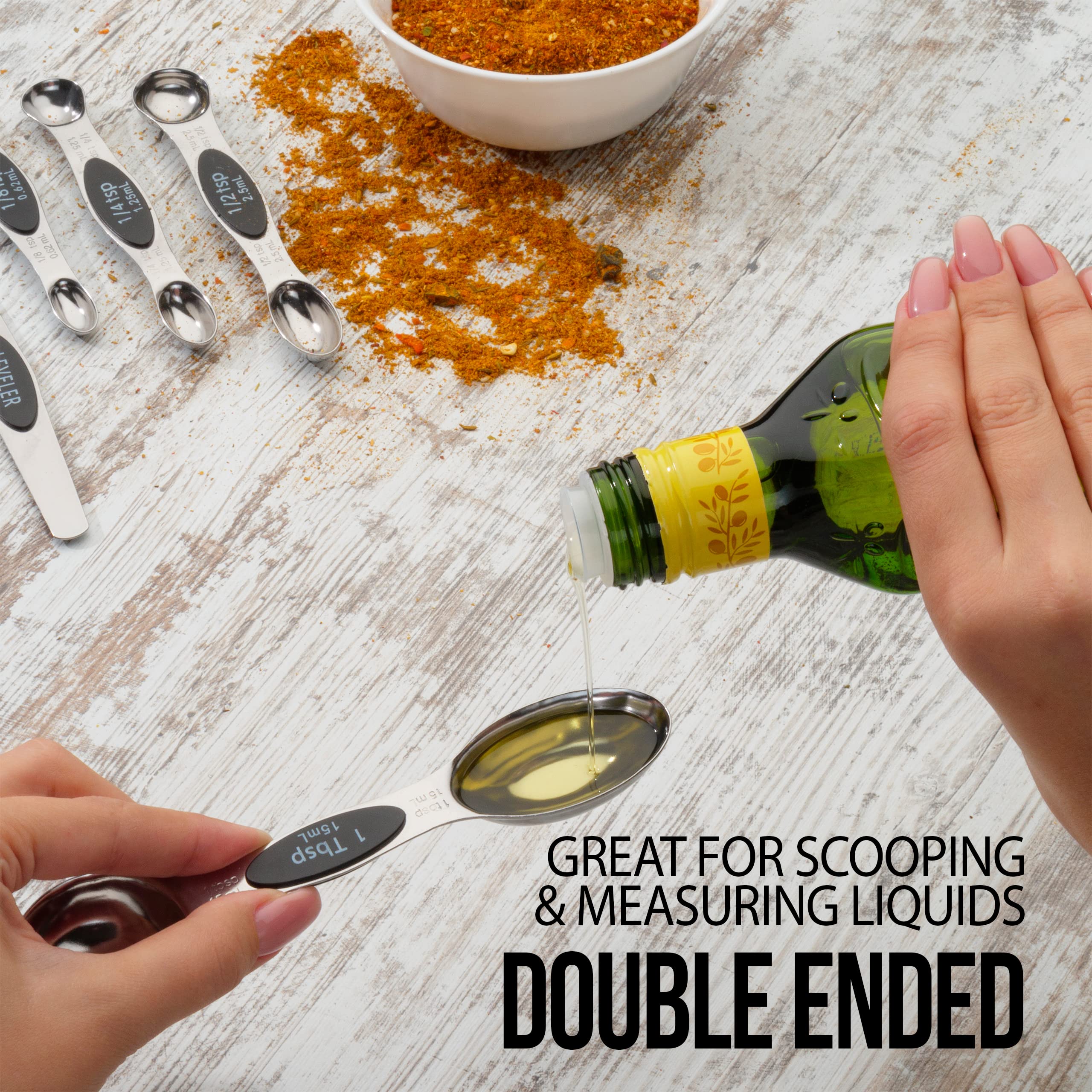 CH1EF spoons securely stacked in a tidy kitchen drawer