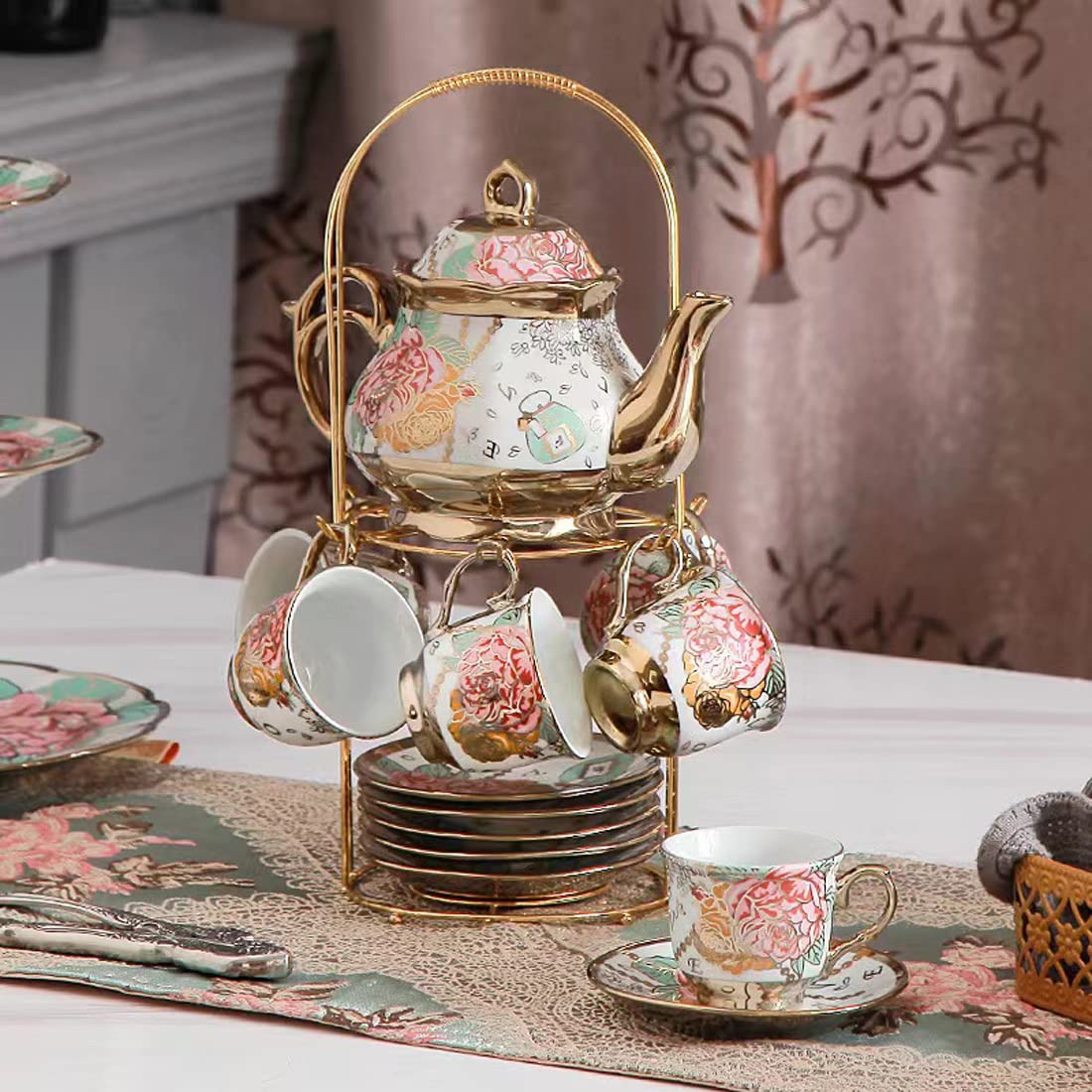 CHANJOON gold-rimmed plates completing the vintage tea set