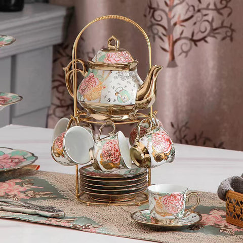 CHANJOON gold-rimmed plates completing the vintage tea set