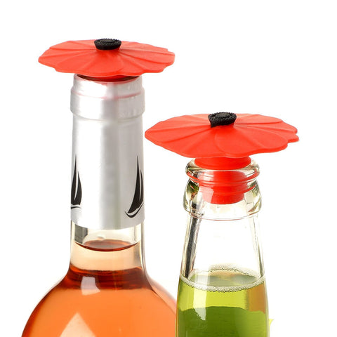 Charles Viancin Poppy bottle stopper shown on a bottle, dishwasher safe and reusable.