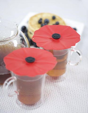 Charles Viancin Poppy lid on glass provides airtight cover for beverages.