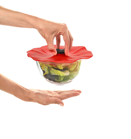 Charles Viancin Poppy silicone lid used in an oven-safe setup helps keep heat contained during cooking.