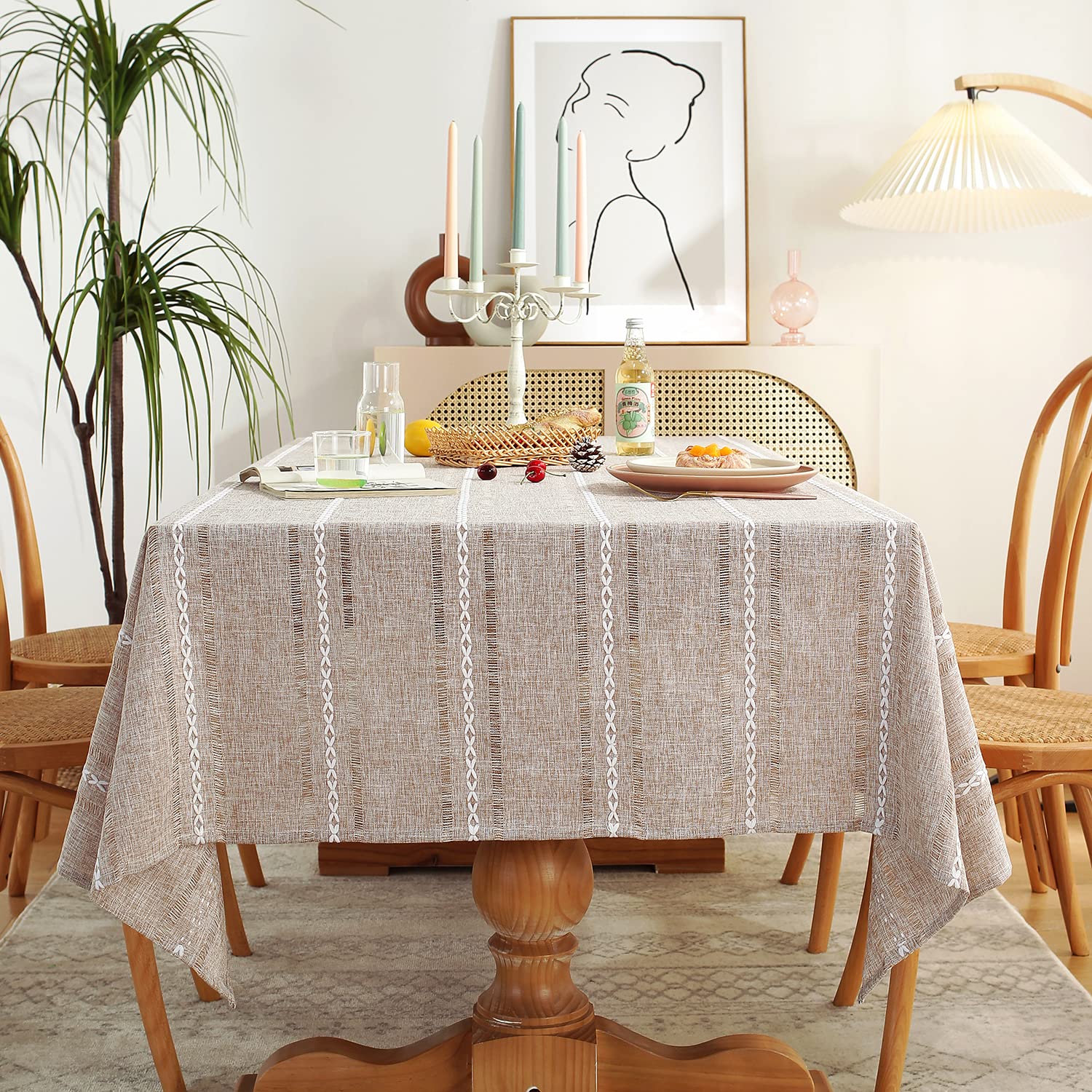 Chassic light coffee hemstitched tablecloth on a 60x84 rectangle table for easy cleanup.