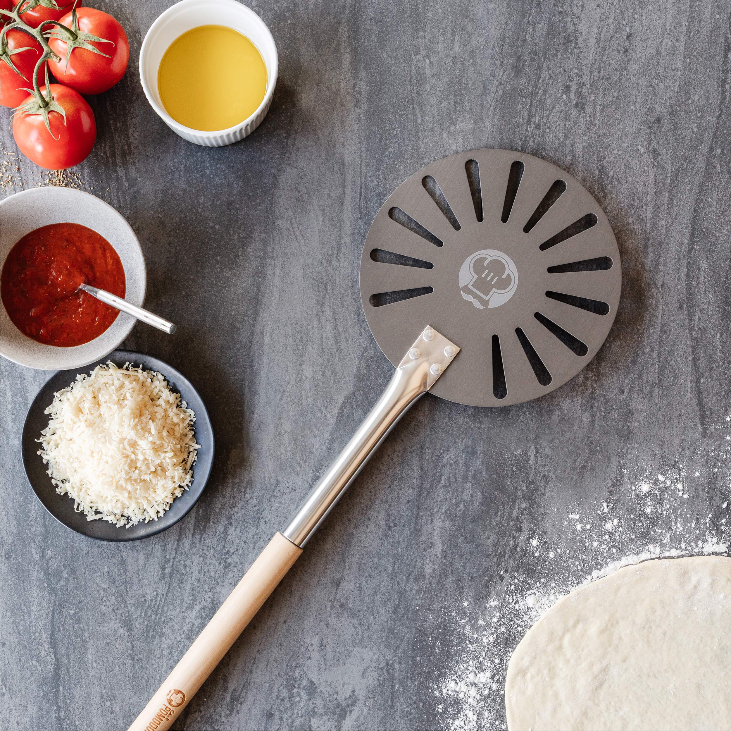 Chef Pomodoro turning peel works with most home and commercial ovens.