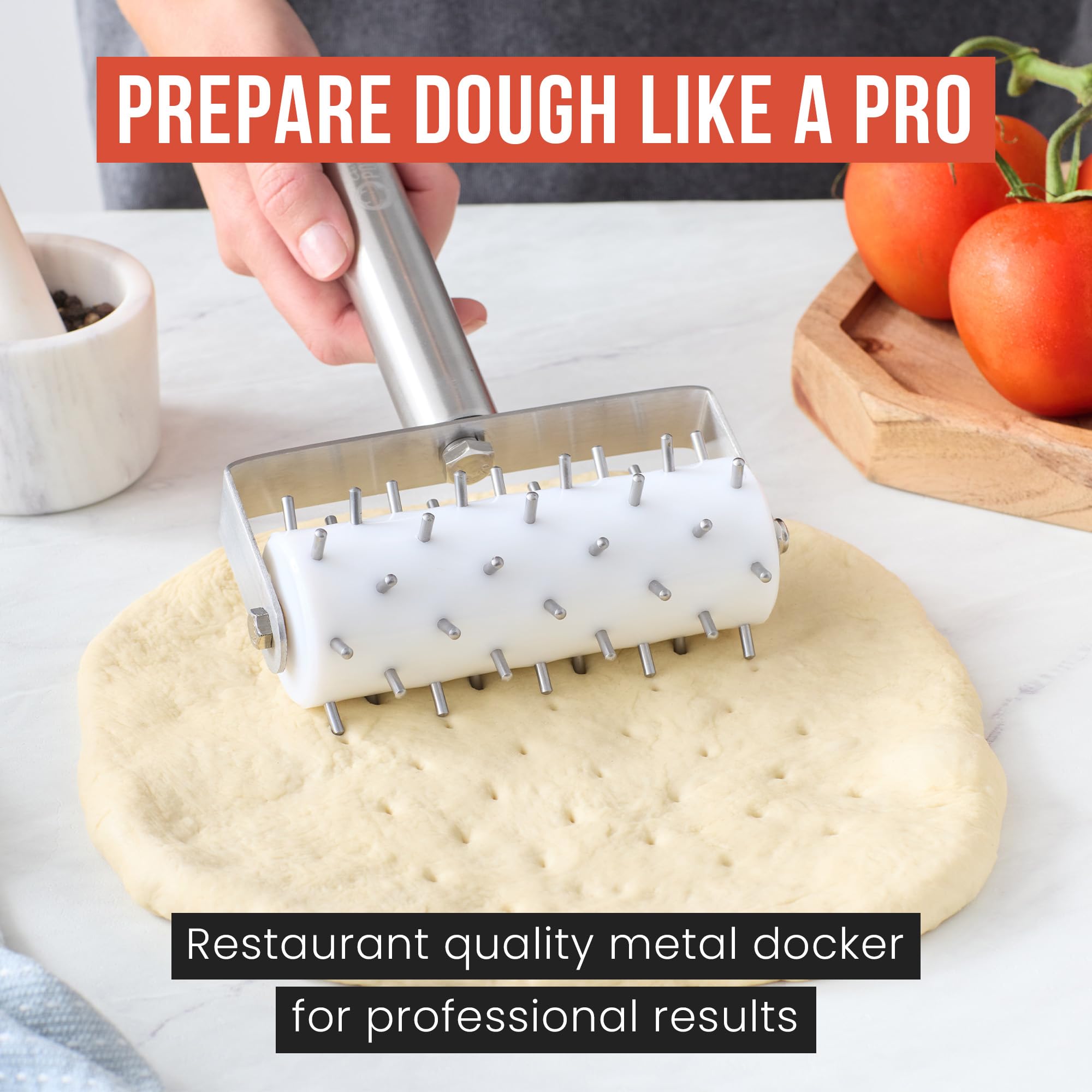 Chef Pomodoro grey plastic dough docker roller promotes even baking.