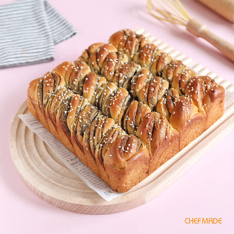 CHEFMADE square cake pan close-up showing smooth nonstick surface for cleanup.