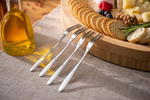 ChefSofi bamboo board complements an elegant table setting for a refined presentation.