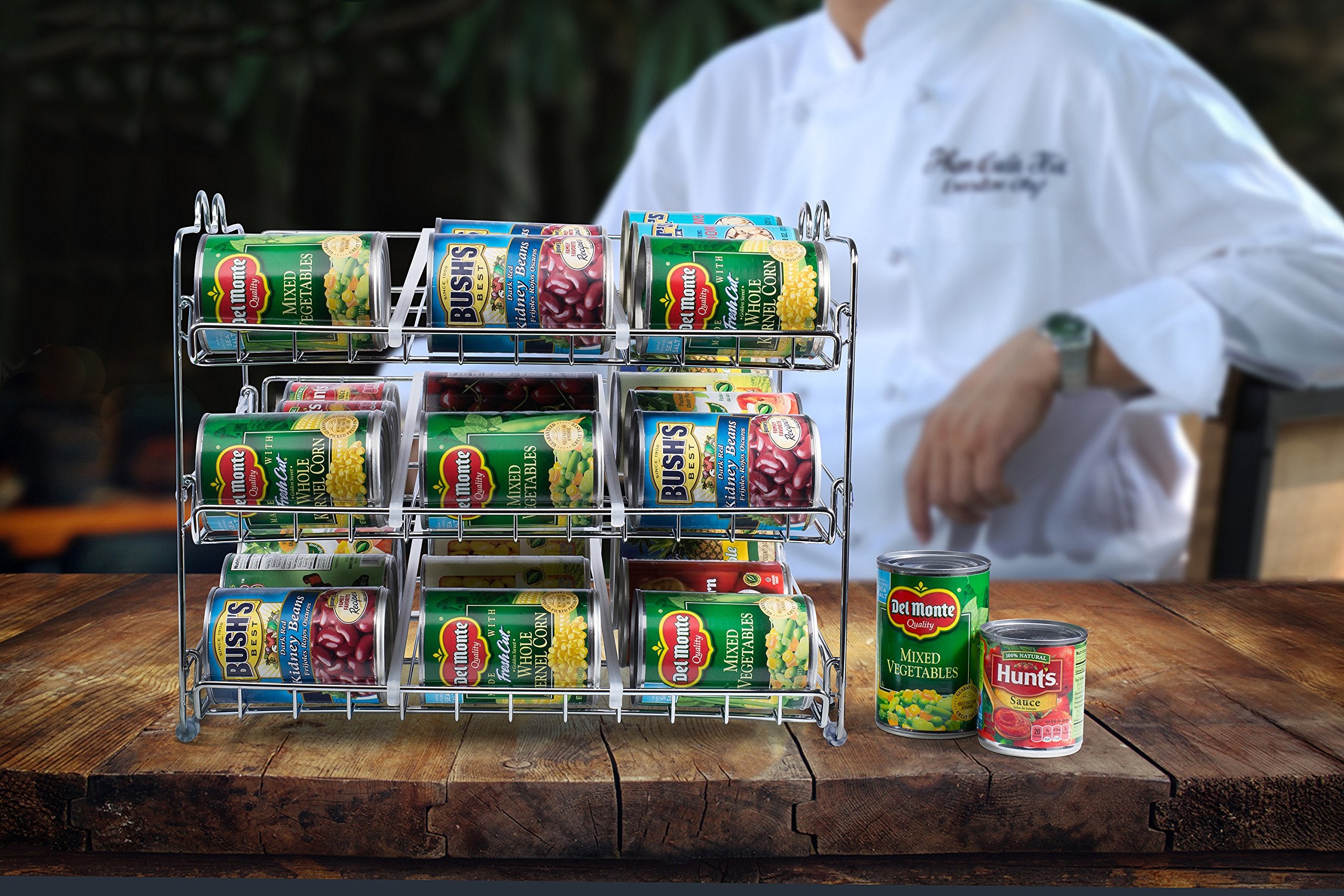 Chemar stackable can rack reduces clutter and keeps frequently used cans within reach.