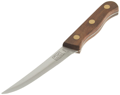 Dinner table scene shows knives ready for steak night with family.