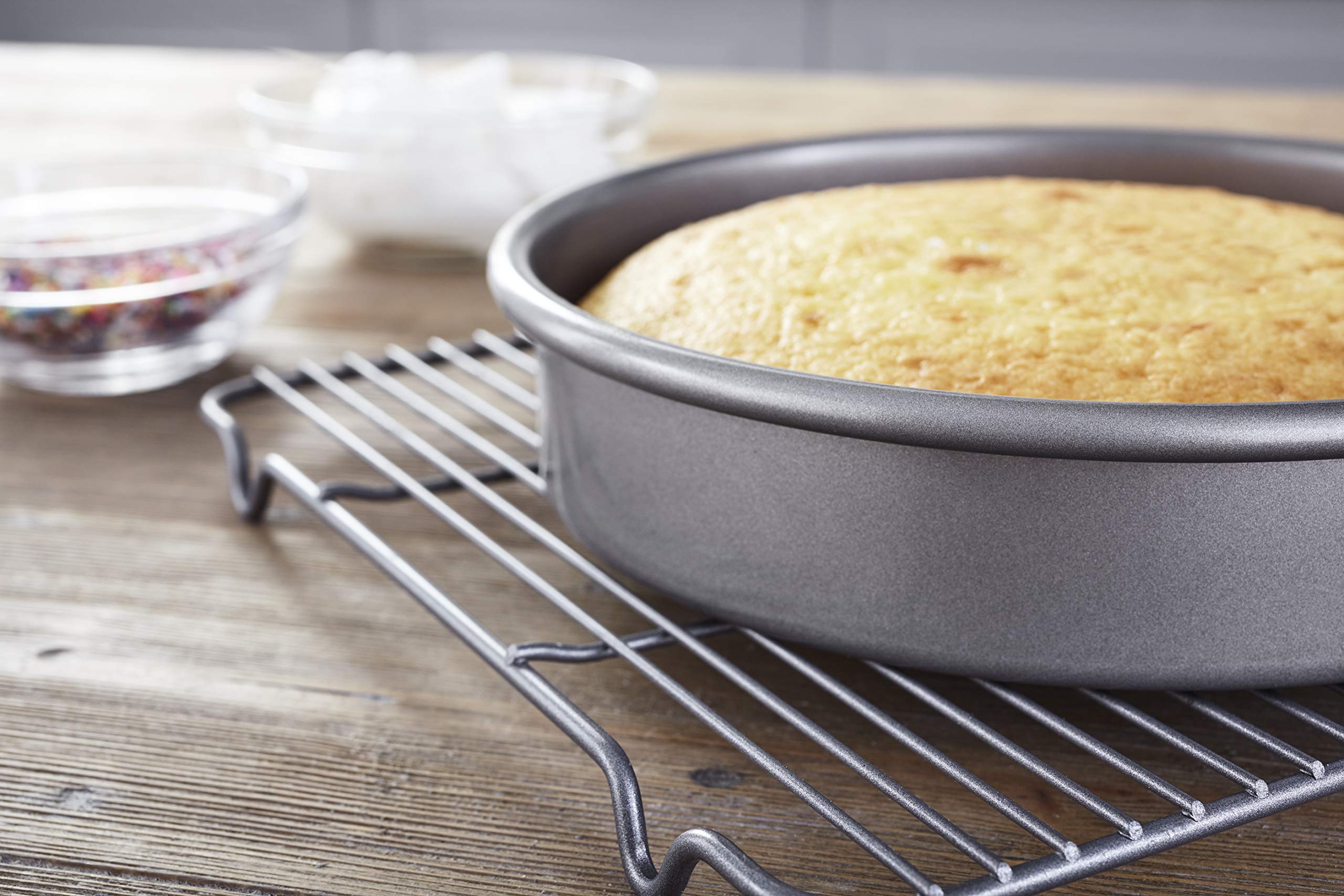 Chicago Metallic Professional non-stick 9-inch round cake pan side angle showing non-stick release.