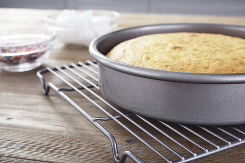 Chicago Metallic Professional non-stick 9-inch round cake pan side angle showing non-stick release.