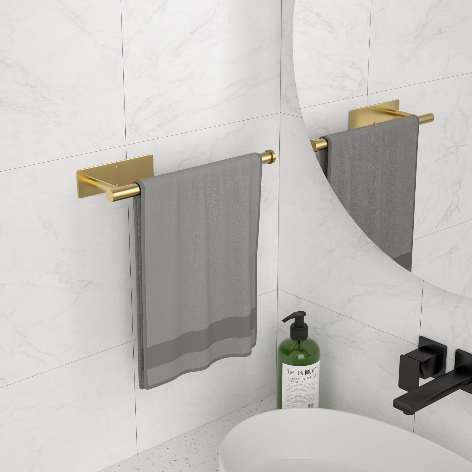 CHIKESI gold finish wall-mount for a stylish kitchen or bathroom.