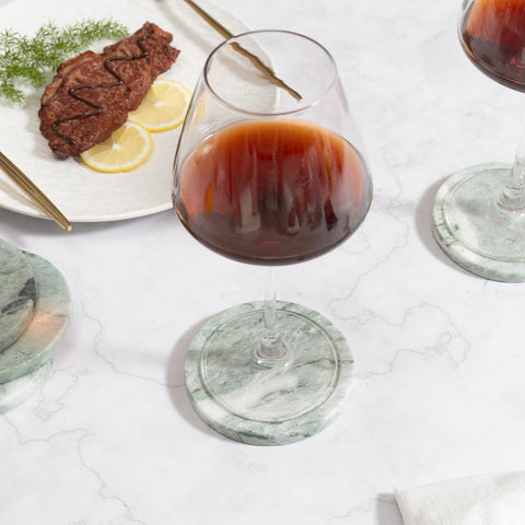 CHISELED ST DF SK gift-ready green marble coasters ideal for housewarmings or holidays.