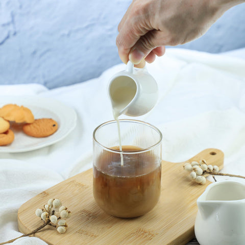CHOOLD ceramic creamer showcasing drip-free spout for clean coffee service.