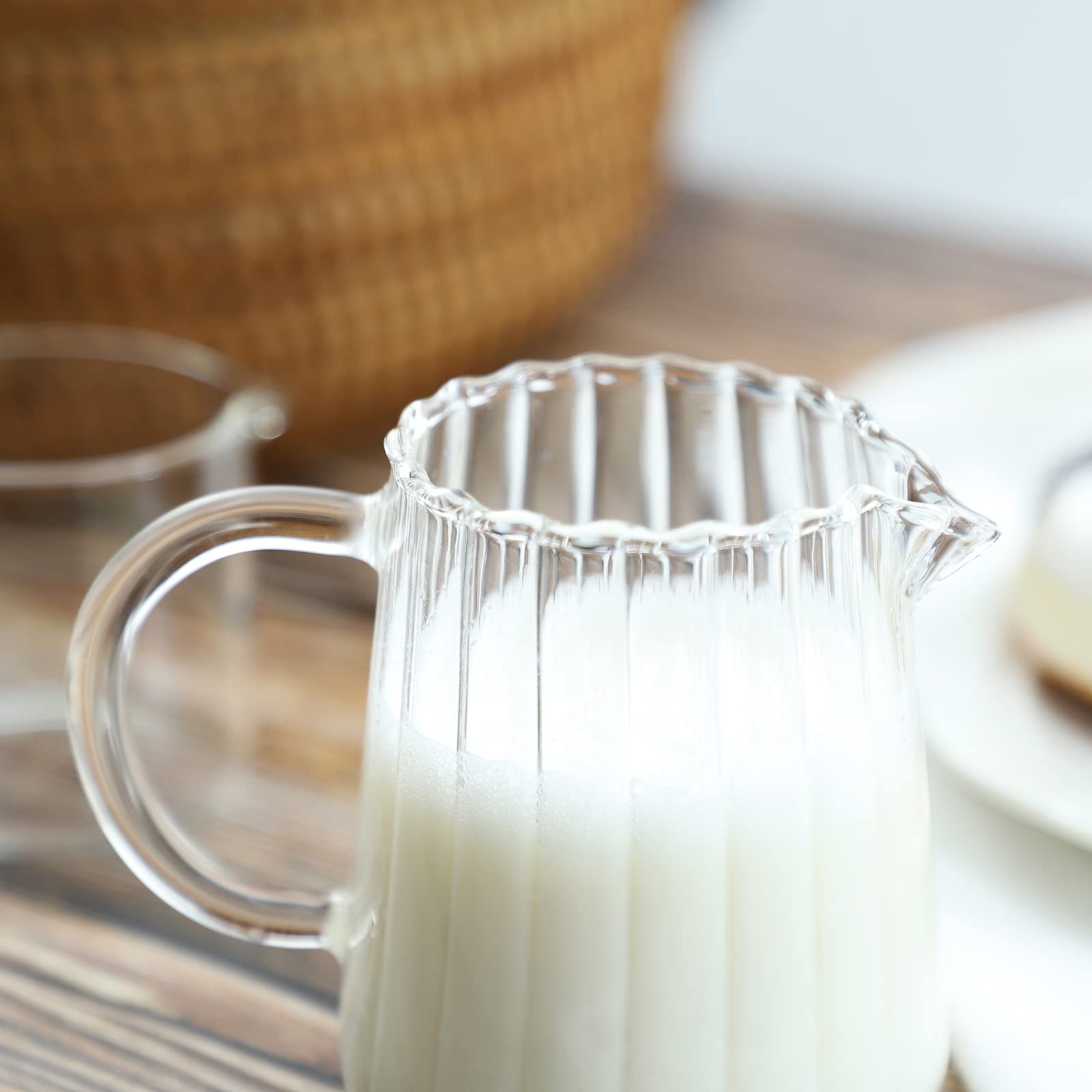 CHOOLD Elegant Wave Crystal Creamer body clearly shows contents for portioning.