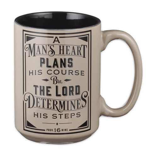 Christian Art Gifts Mans Heart Mug front view with Proverbs 16:9 for daily inspiration.