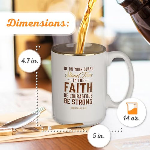 Christian Art Gifts stand firm in faith mug with brown and gold print for focus during coffee.