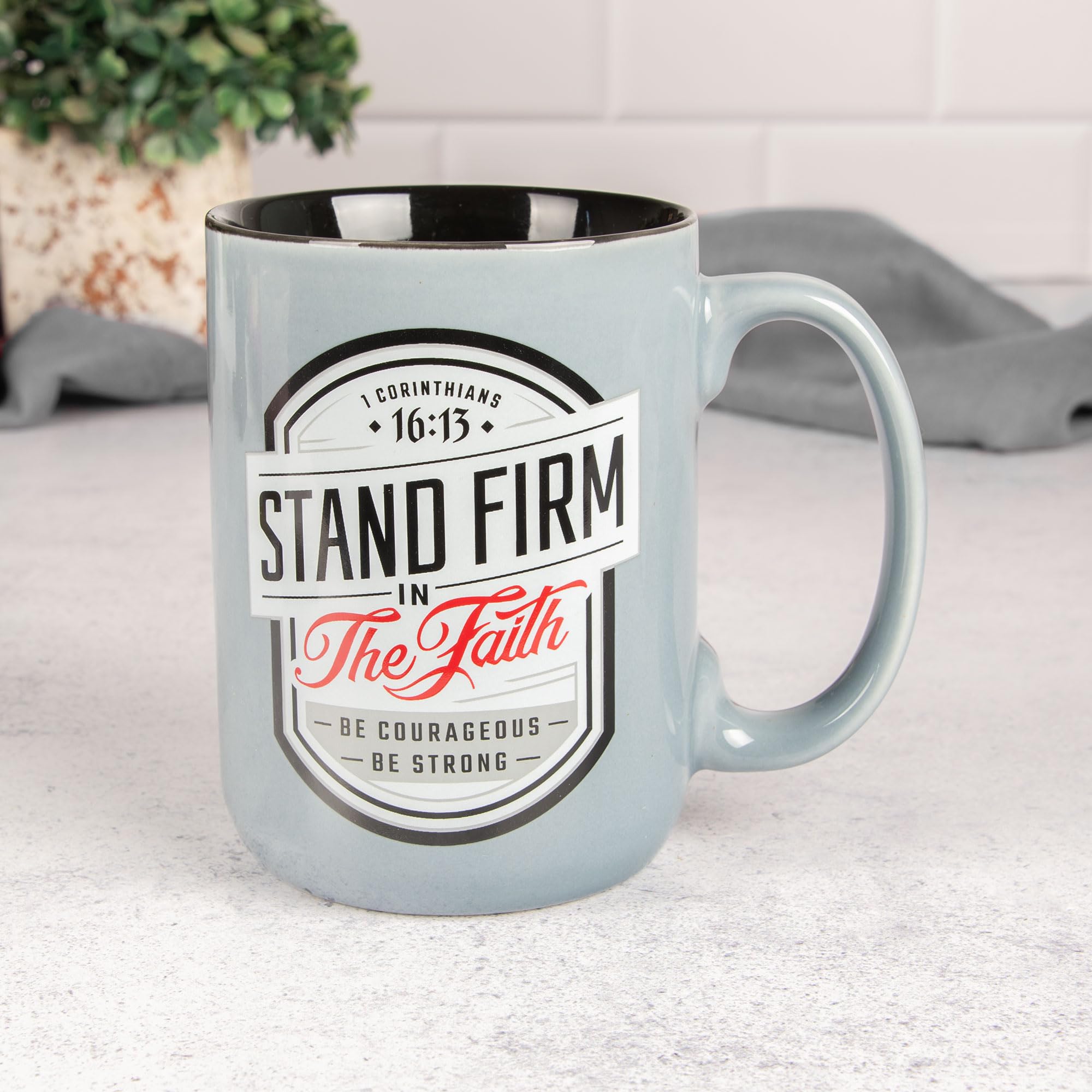 Christian Art Gifts Stand Firm mug quote-detail highlights bold typography in a stylish frame