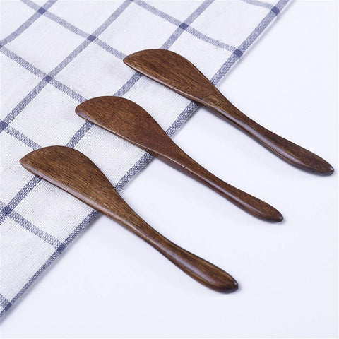 CISHNOU butter knives in Nanmu wood for smooth spreads and dips.