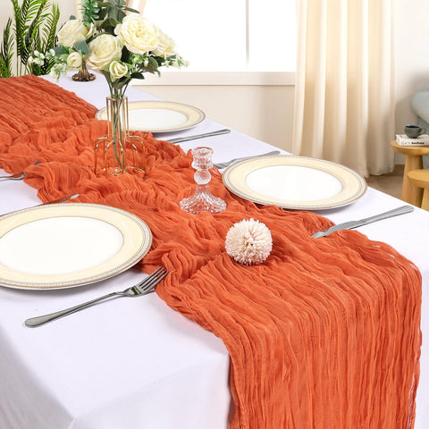 CKIKU 21x120-inch orange cheesecloth table runner drapes beautifully on long tables