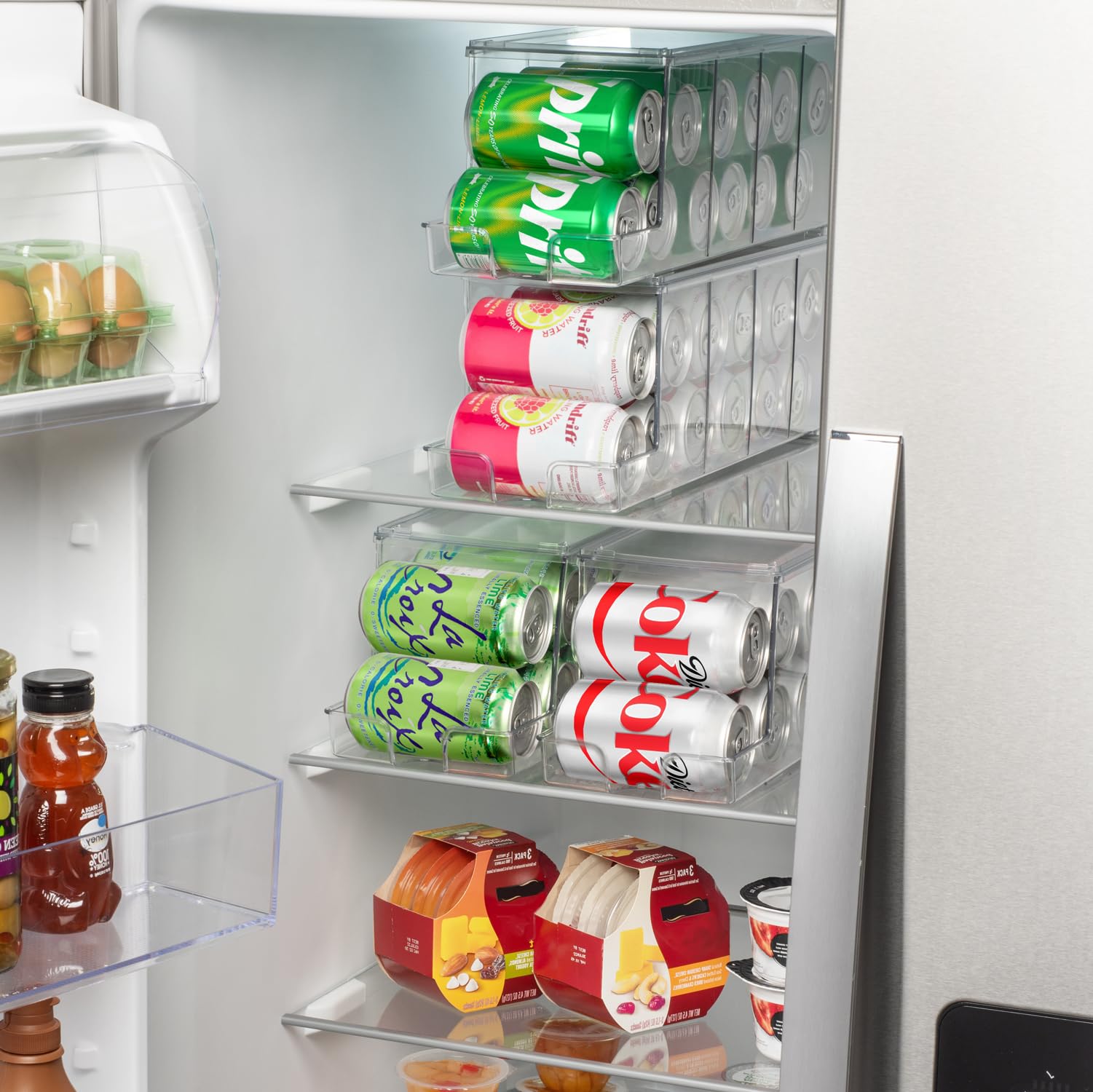 Two ClearSpace organizers with twelve cans each keep drinks organized.
