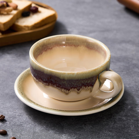 Coffeezone brown ceramic cup close-up highlighting round bottom for latte art