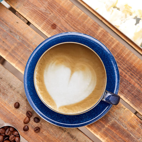 Coffeezone dark blue ceramic cup with saucer highlighting sleek glaze