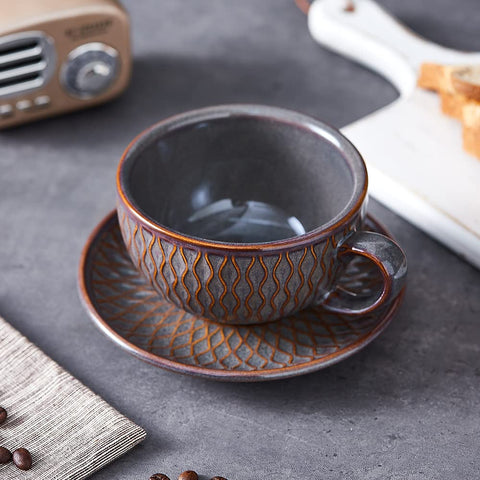 Coffeezone embossed grey saucer showcasing premium aesthetics and serving convenience.