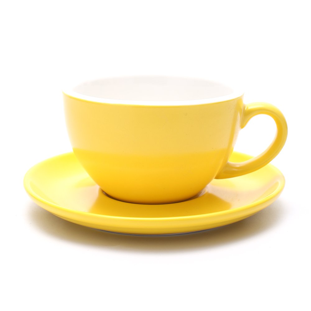 Coffeezone latte art cup in matte yellow showing a stable pour for latte art