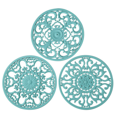 Colinda trivet set turquoise design 1 protects surfaces from heat.