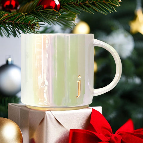 COLLECTIVE HOME mug with gold detailing adds elegance to special occasions.