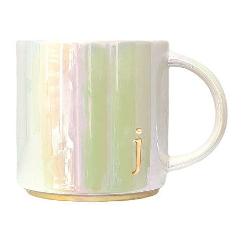 COLLECTIVE HOME ceramic mug with iridescent finish, elevating daily coffee moments.