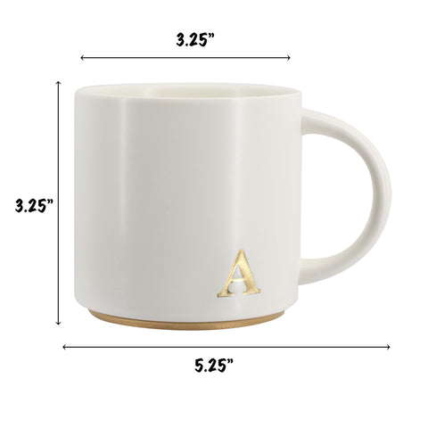 COLLECTIVE HOME gold-plated initial mug for elegant tea and coffee rituals.