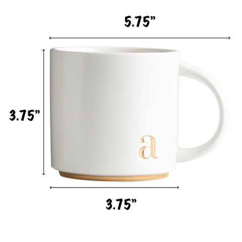 COLLECTIVE HOME monogram mug with gold accent, elevating your coffee ritual.