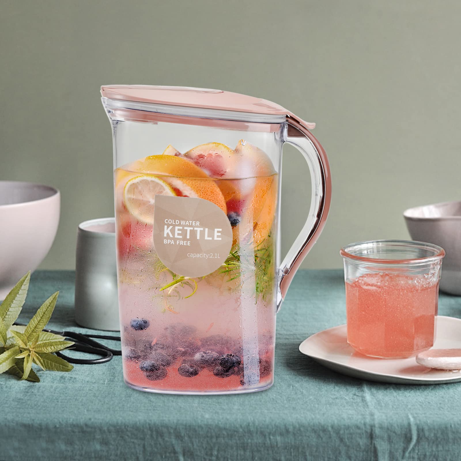 Coloch pitcher lid with flexible seal prevents spills.