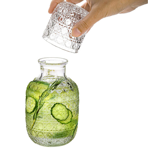 Coloch carafe on nightstand with glass for easy reach and hydration