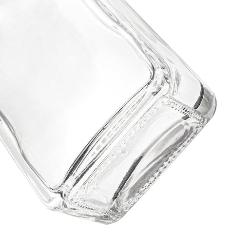 Coloch heavy base glass bottle emphasized for stability on home bars