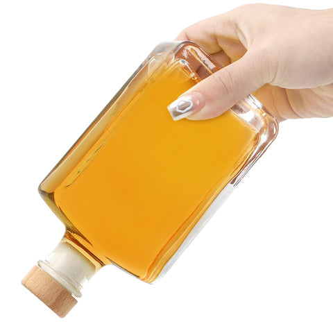 Coloch shrink capsule closeup illustrating heat-shrink fit around bottle neck