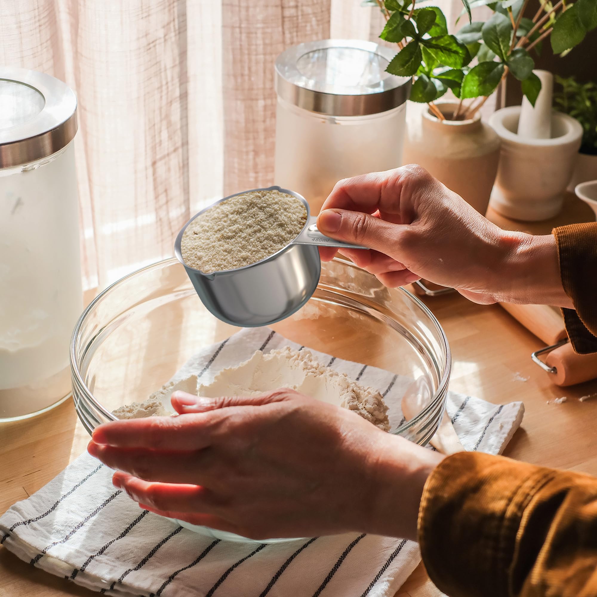 Color Up measuring cup with dual pour spouts for mess-free transfers