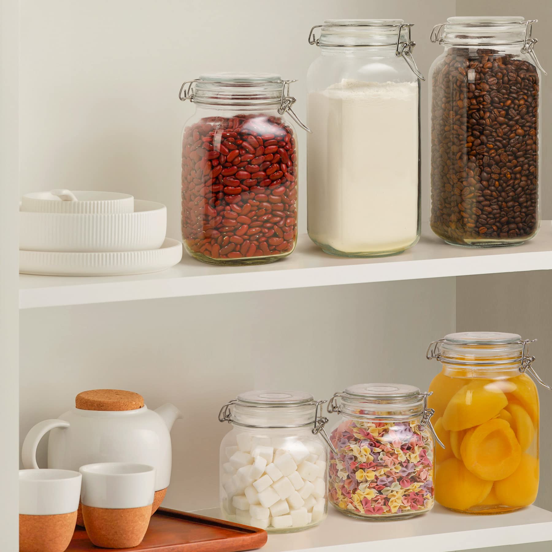 Clear glass jars improve pantry visibility for easy inventory and planning.